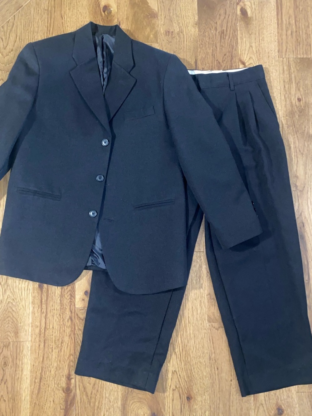 Boys size 12 Husky black Dockers suit- two pieces.